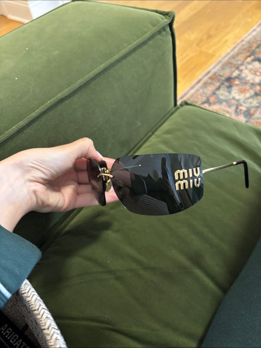 Miu Miu Black Rimless Sunglasses with Gold Logo Accent